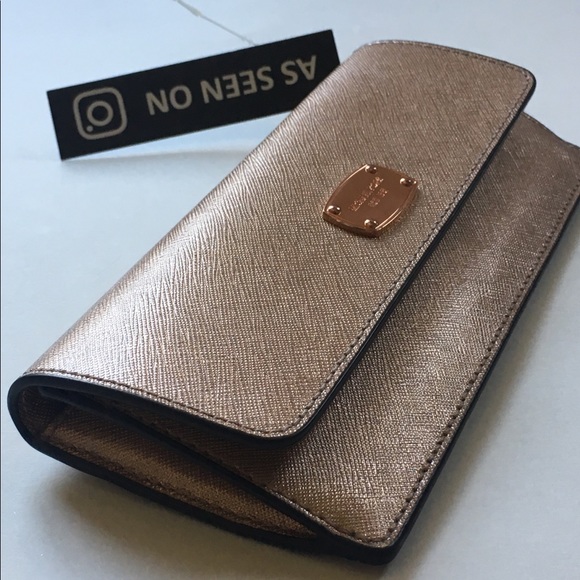 Michael Kors Handbags - Michael Kors Shimmering Blush Clutch
